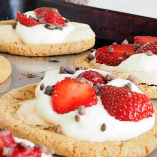 These gluten-free mini Swedish Midsummer Meringue Cakes make a delicious, festive dessert for parties, celebrations, and afternoon coffee with friends (fika). Perfect for strawberry season but also delicious with other berries too. From halsanutrition.com #theRecipeReDux