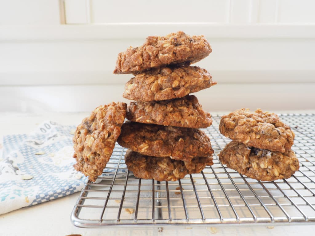 These chocolate chip cookies are soft, chewy, delicious, and healthier than most cookies! Made with wholesome ingredients such as whole grain flour (spelt or white whole wheat) + old-fashioned oats + applesauce + a little sugar and dark chocolate. Yum! Dairy-free, whole grain, and lower in sugar than most cookies.