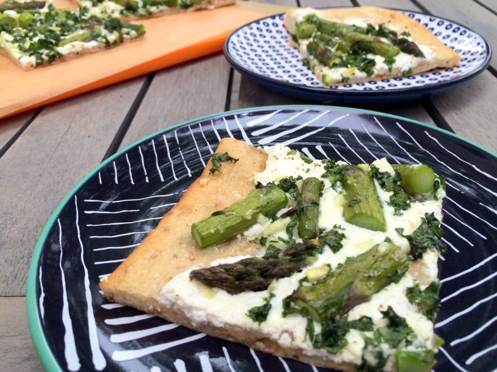 asparagus, kale and ricotta flatbread - simple, fresh, healthful and perfect for your spring or early summer get together! Eat as an appetizer or serve tapas style with a variety of other delicious treats! halsanutrition.com