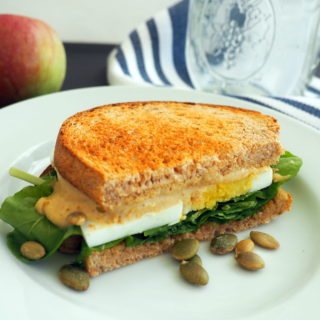 Breakfast Sandwich with Hummus, Scrambled Eggs and Tomato - Half Cup Habit