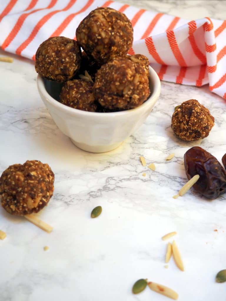 These vegan and gluten-free pumpkin spice balls provide a perfect pre-workout fuel or mid-afternoon energy boost. Roll them in mini chocolate chips and they become a wholesome dessert!