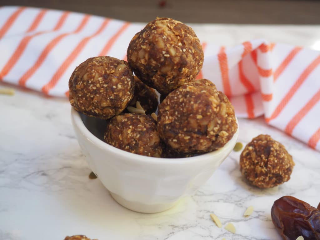 These vegan and gluten-free pumpkin spice balls provide a perfect pre-workout fuel or mid-afternoon energy boost. Roll them in mini chocolate chips and they become a wholesome dessert!