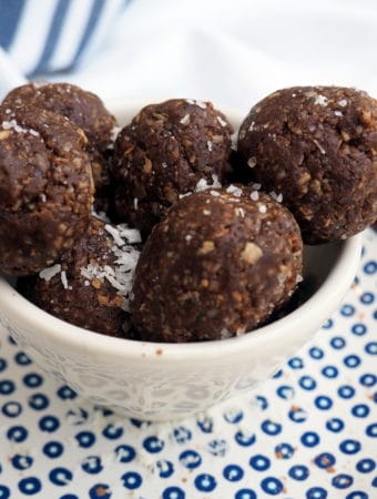 These nut-free cocoa-coconut bliss balls make a perfect lunch box treat! Sweetened with only medjool dates they are sure to be one of your families new favorite treats! They are also gluten-free, soy-free, egg-free, and dairy-free.