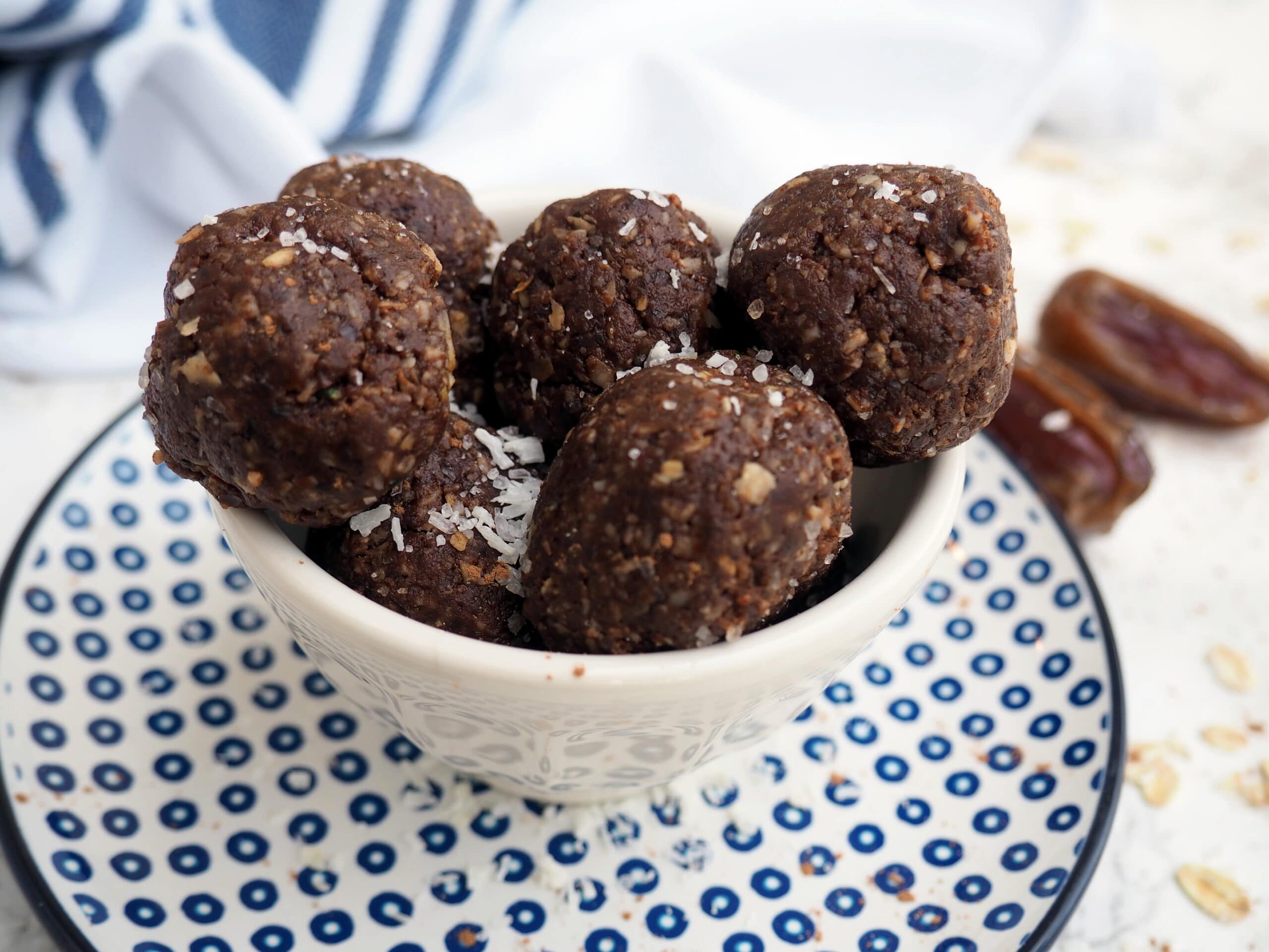 These nut-free cocoa-coconut bliss balls make a perfect lunch box treat! Sweetened with only medjool dates they are sure to be one of your families new favorite treats! They are also gluten-free, soy-free, egg-free, and dairy-free.