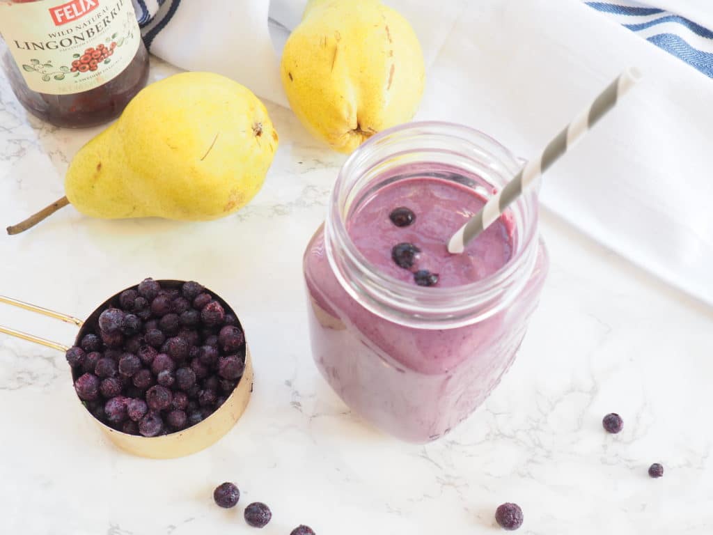 #ad This wild blueberry and pear smoothie is a refreshing healthy way to start your day. #wildyourmoothie #wildblueberrysmoothie