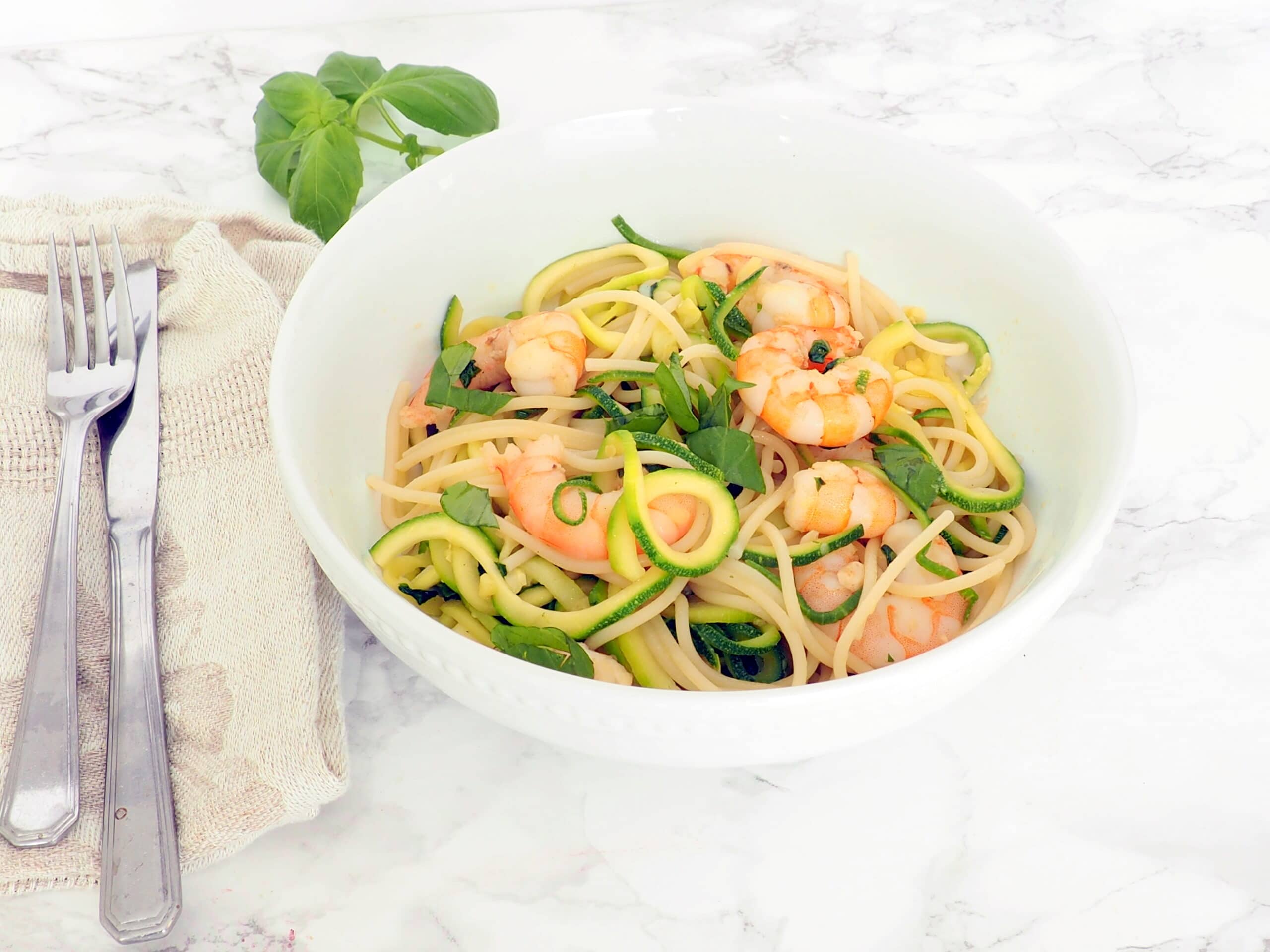Zucchini noodle pasta is a great way to make classic pasta healthier and lighter. Make it family friendly with my mix-in ideas and, of course, serving it up several times before you give up!