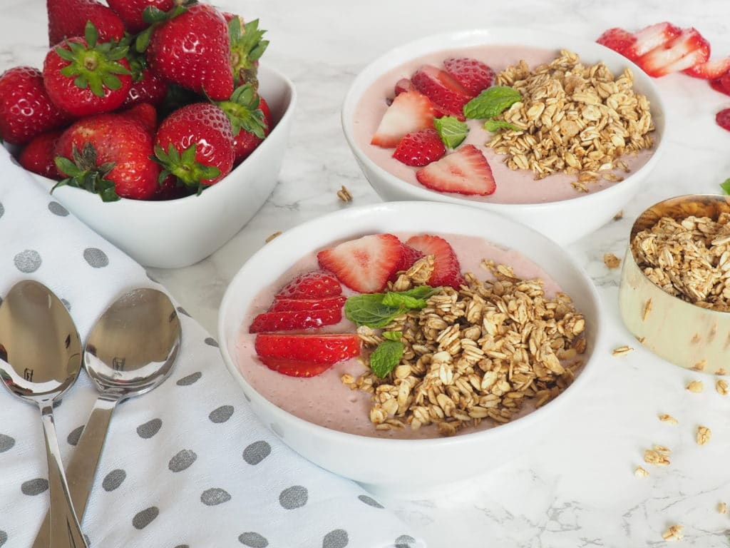 This good morning smoothie bowl with granola is a fun, healthy, and delicious way to start your family's morning! The smoothie is simple to make with kefir, vanilla skyr, frozen fruit, and chia seeds. 