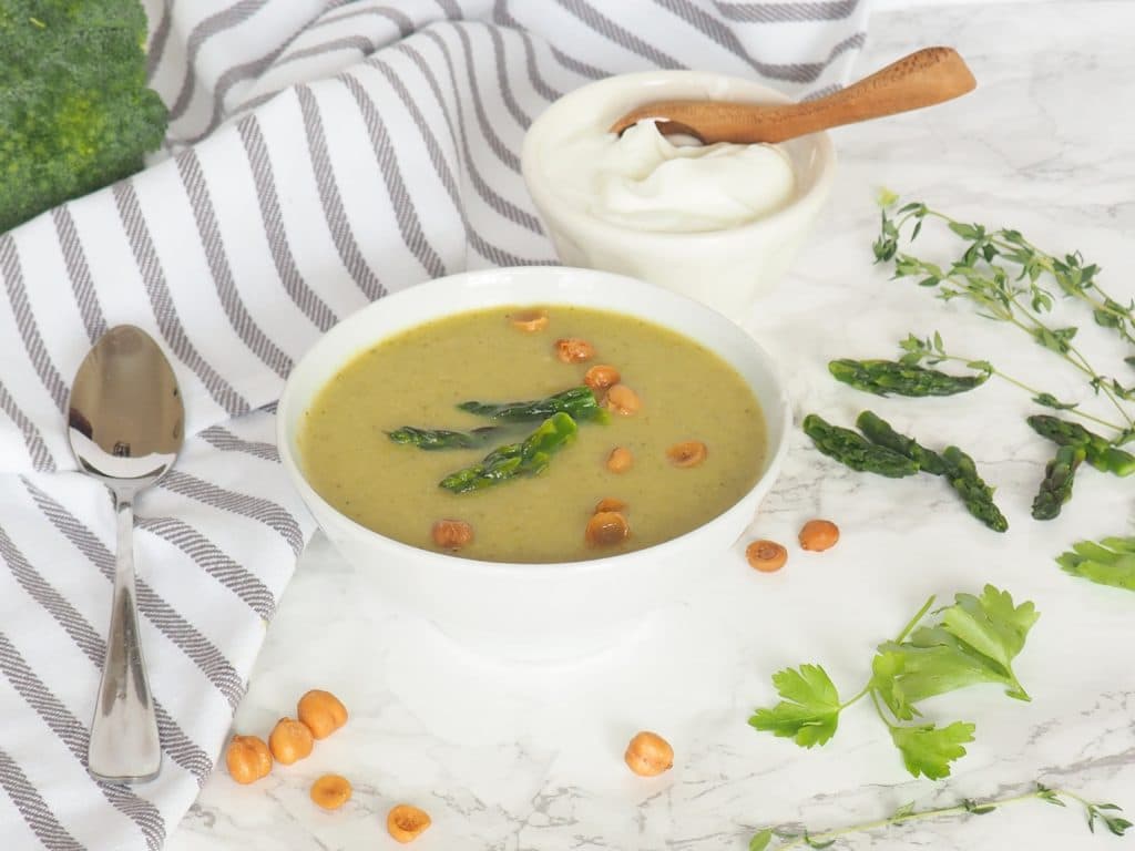 This Asparagus-Broccoli Soup is light, fresh, and nutrient-packed. Perfect spring, serve it as an appetizer before dinner or alongside baguette and cheese or a quinoa-strawberry salad for a healthy lunch. Dairy-free, gluten-free, vegetarian option, and nut-free. Halsanutrition.com