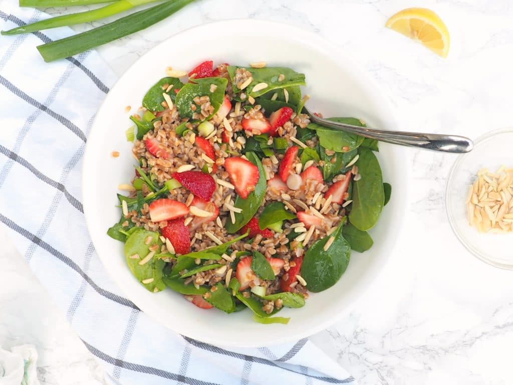 This strawberry, spinach, and farro salad is perfect for showcasing juicy, ripe strawberries. Farro is an ancient whole wheat grain that packs in 7 grams of fiber and protein per serving! A perfect side salad for your weeknight dinner or potluck salad at your next cookout. The strawberries will help entice young eaters to try the salad too!