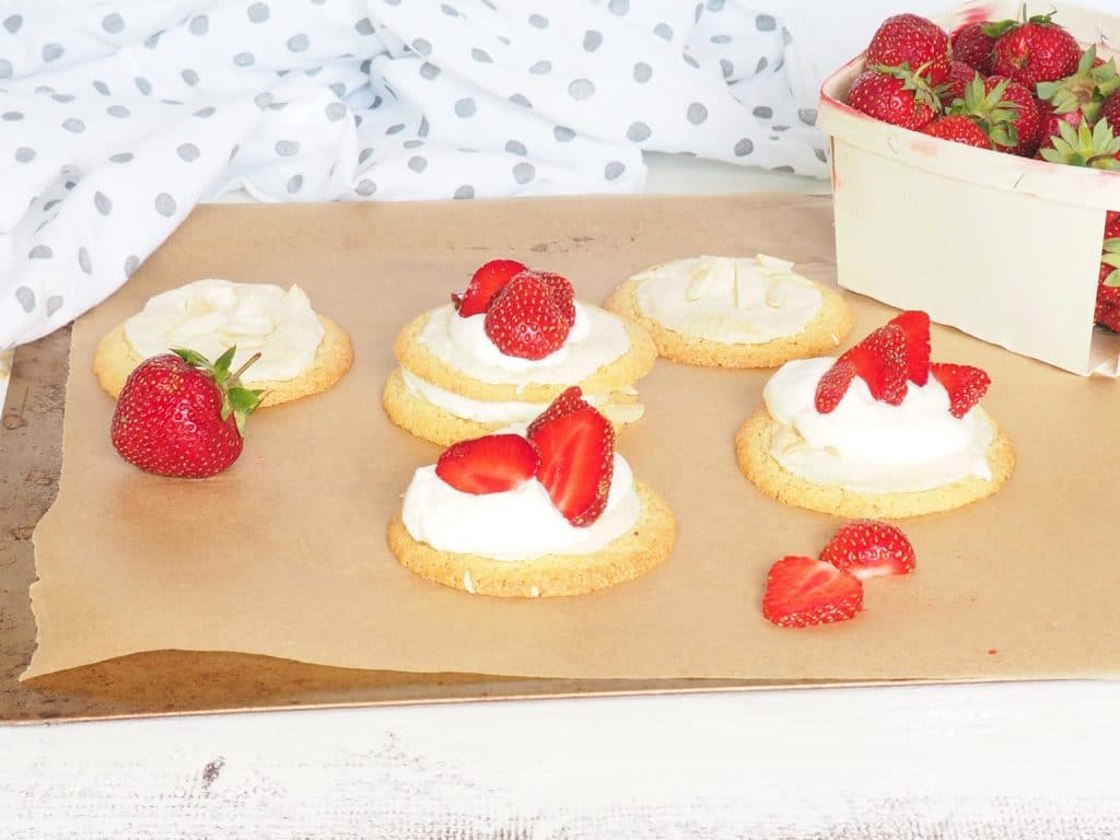 These gluten-free mini Swedish Midsummer Meringue Cakes make a delicious, festive dessert for parties, celebrations, and afternoon coffee with friends (fika). Perfect for strawberry season but also delicious with other berries too. From halsanutrition.com #theRecipeReDux