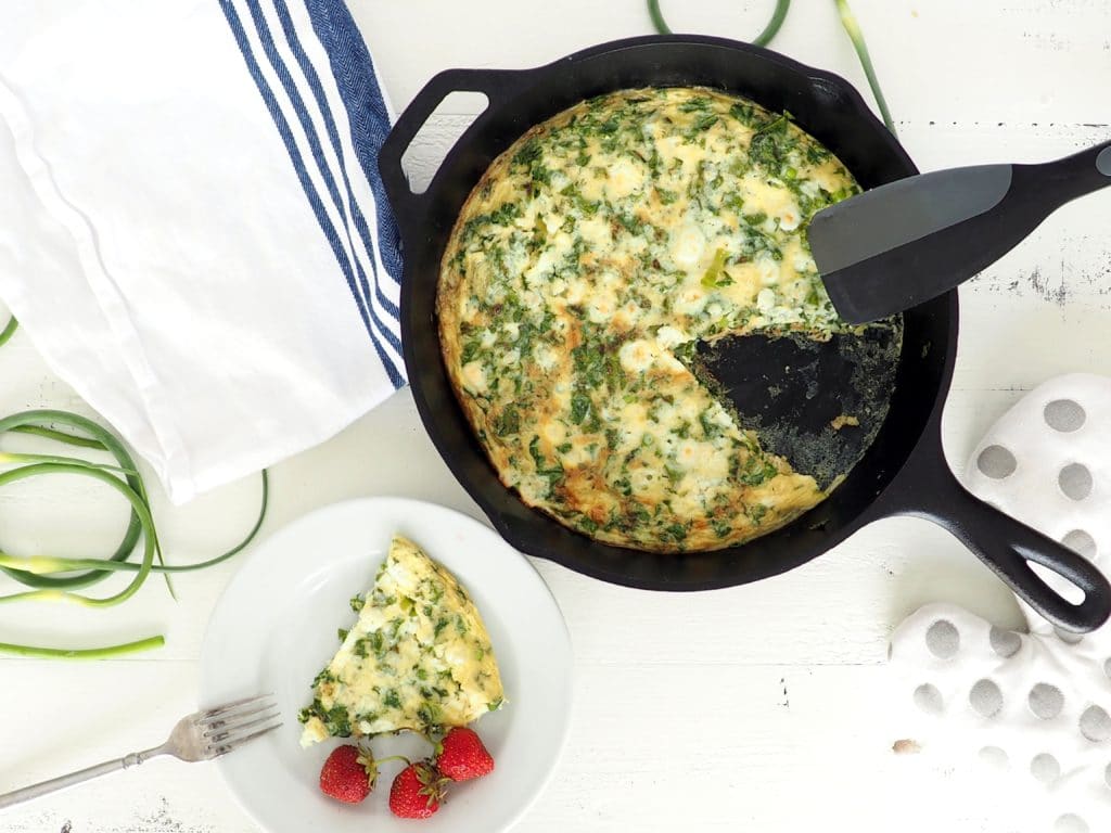 This kale and garlic scape frittata makes a delicious healthy meal. It's perfect for using up that leftover kale and a good way to use some of those fun garlic scapes that abound in late June. Gluten-free & vegetarian. halsanutrition.com