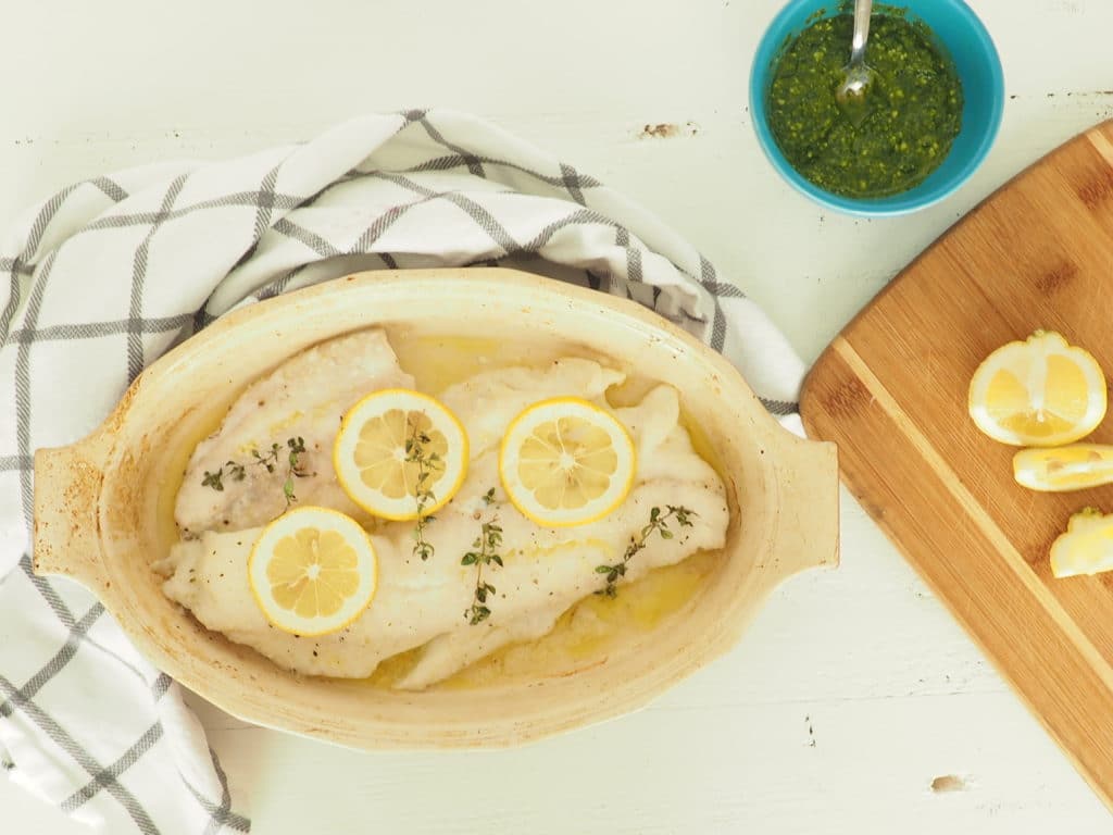 This oven-baked haddock with pesto sauce makes for a simple and tasty family dinner. Make pesto ahead of time or use store-bought and you can have dinner ready in less than 20 minutes! Gluten-free and dairy-free if you omit cheese in pesto. Enjoy! From halsanutrition.com 