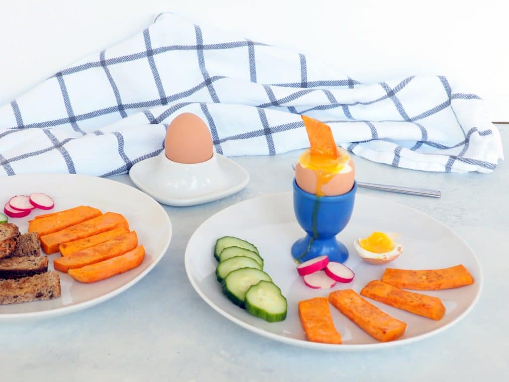 Old-school dippy eggs get a fresh update with addition of sweet potato soldiers and a side of veggies. This nutritious, colorful breakfast is perfect for fueling up before school or work. Fun. Simple. Protein-packed. Nutrient-rich. Gluten-free. Kid-approved. Mom-approved. From halsanutrition.com #thereciperedux
