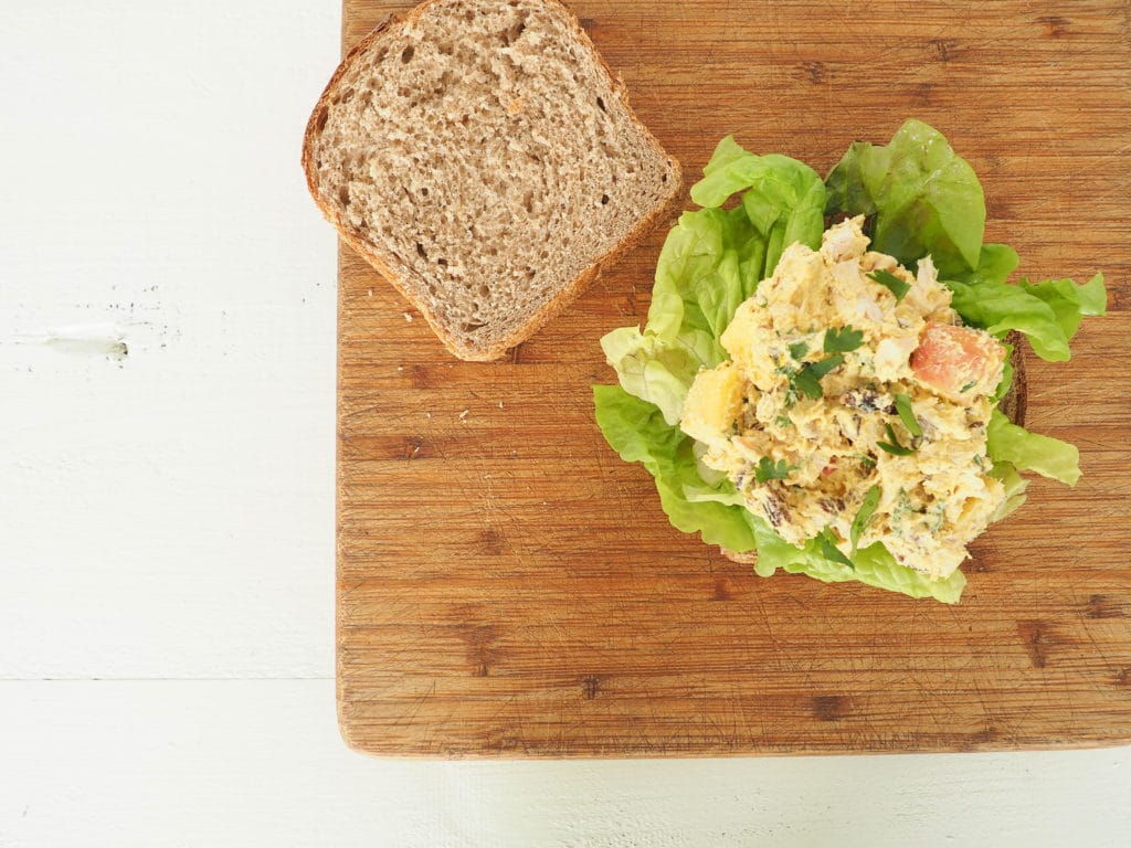 This healthy curry chicken salad is perfect for everything from work lunches to picnics. Made with yogurt instead of mayo and a little extra turmeric powder it's sure to spice up your lunch. Gluten-free. From halsanutrition.com