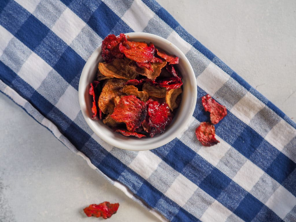 These sea salted beet chips make a fun crunchy snack or appetizer! From halsanutrition.com #thereciperedux