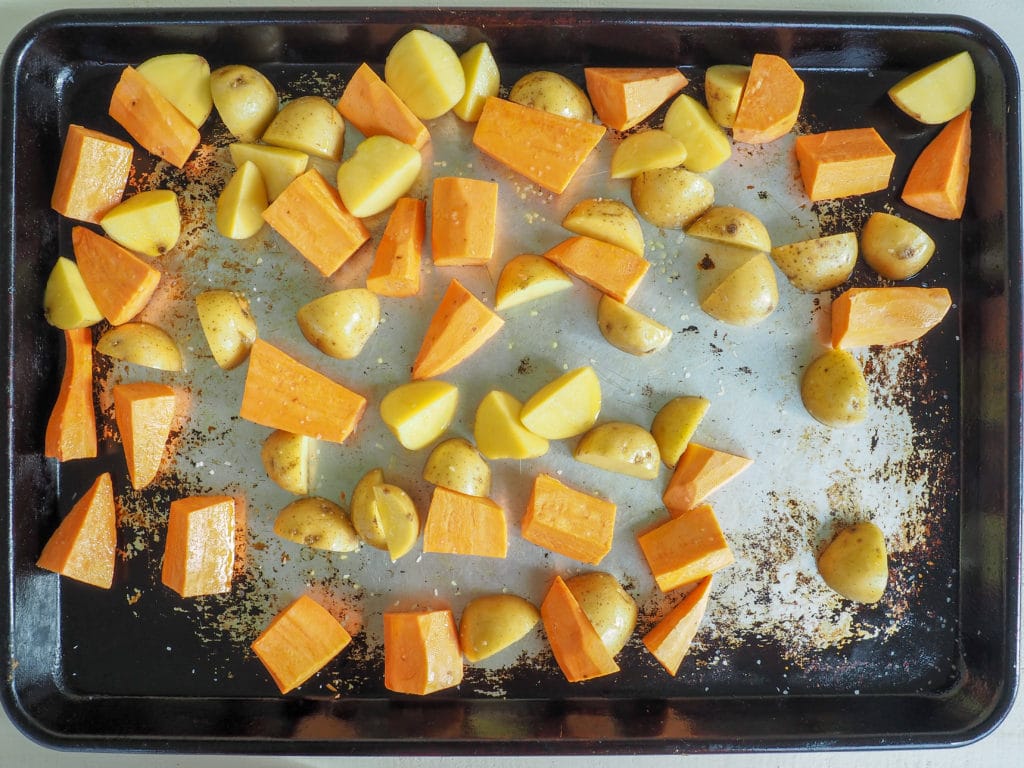 sheet pan cod & veggie dinner with potatoes, sweet potatoes, broccoli - a family favorite!
