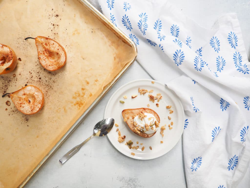 These baked maple and cinnamon pears make a perfect dessert but are healthy enough for breakfast! Gluten free, vegan, and kid-approved. Serve with sides such as Skyr, whipped cream, coconut cream, and homemade granola.