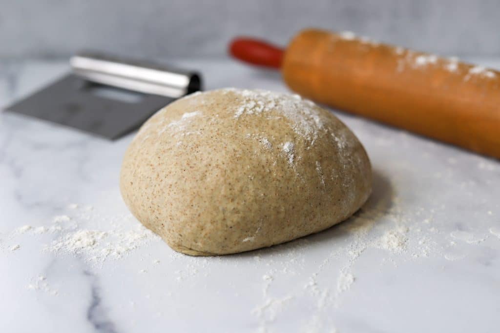 pic of pizza dough and rolling pin