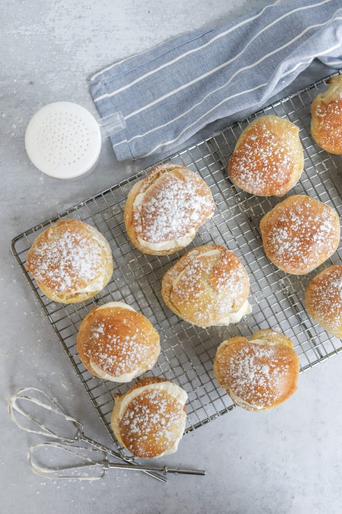 cardamom buns with almond paste, whipped cream, and powdered sugar
