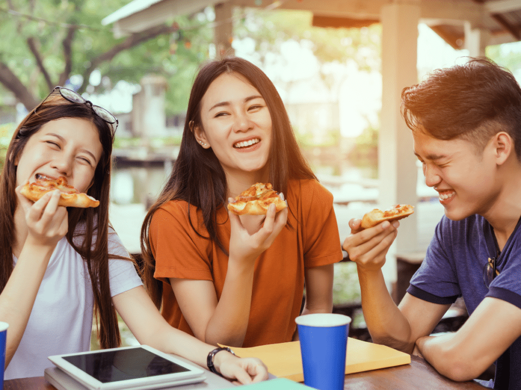 National Eating Disorders Awareness Week 2024
college students eating pizza