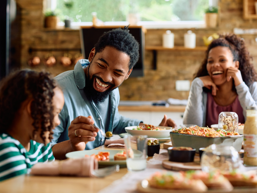 family eating dinner happy