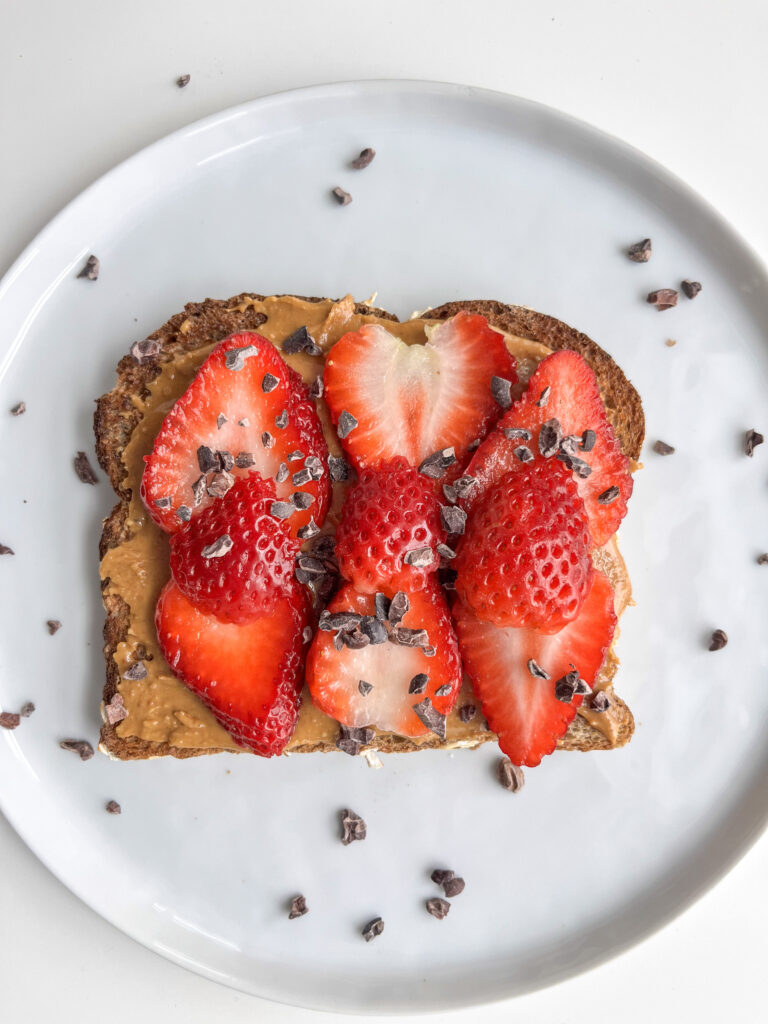 Strawberries, peanut butter, and cocoa nibs